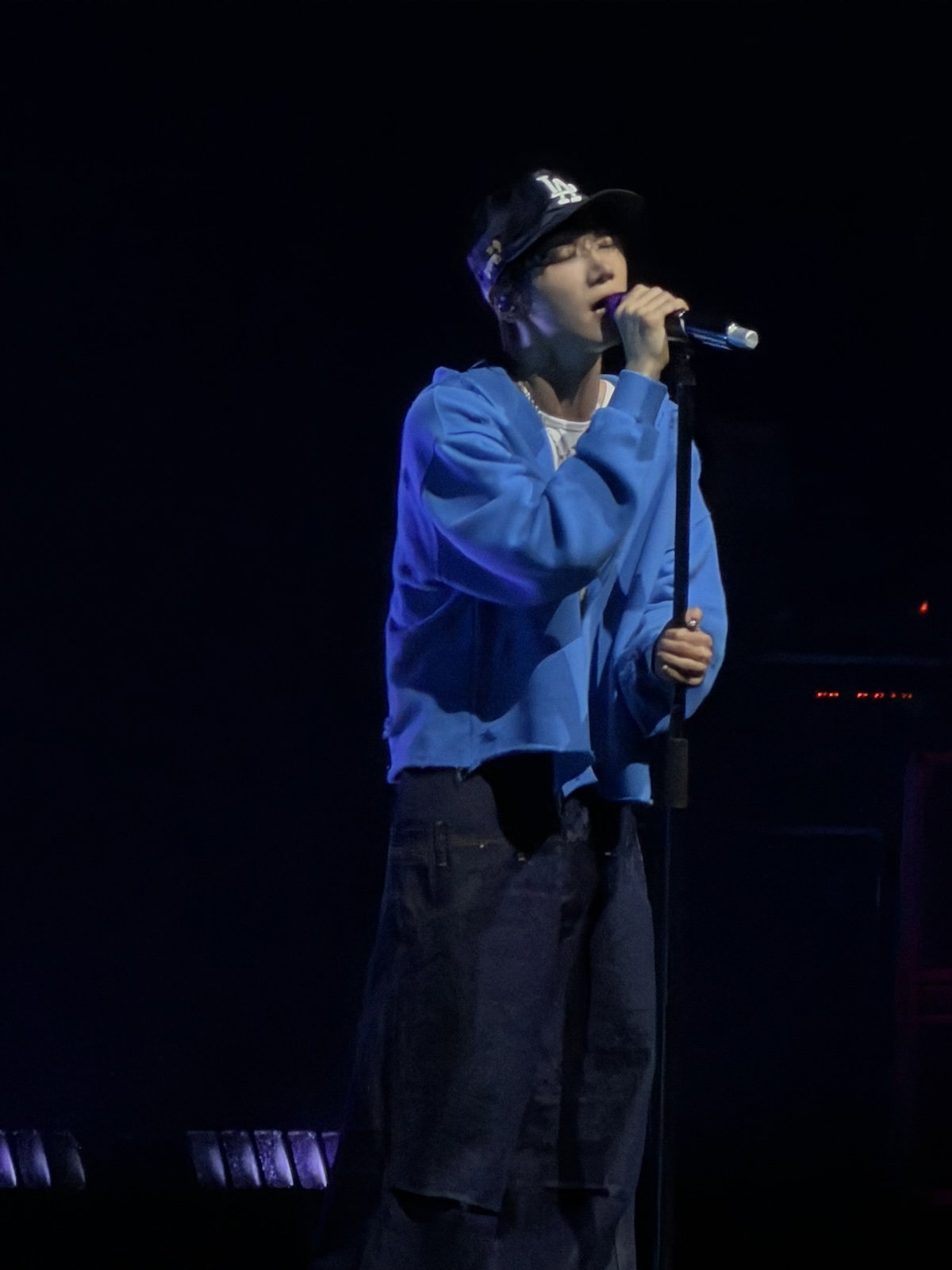 TEN performing at The Novo in blue hoodie