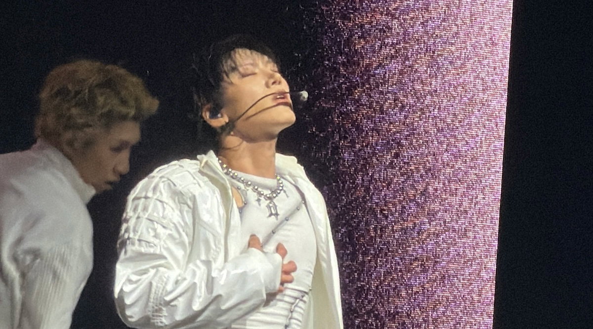 TEN performing at The Novo in all white